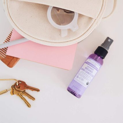 Dr. Bronner's Lavender Hand Sanitiser next to bag and keys