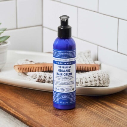 Dr. Bronner's Hair Creme Peppermint 177ml in bathroom corner
