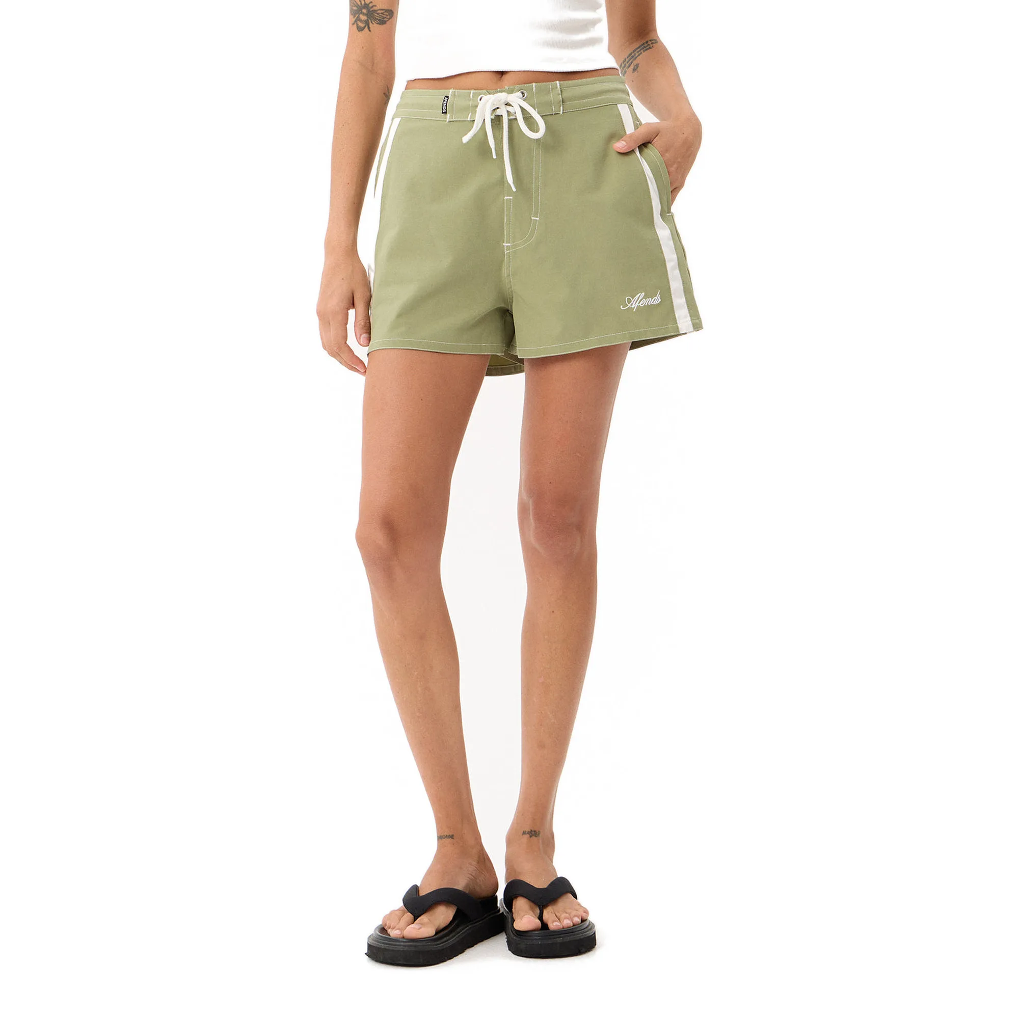 Afends Ellia Boardshorts in Sage, front view on white, showing the white drawcord and side panels